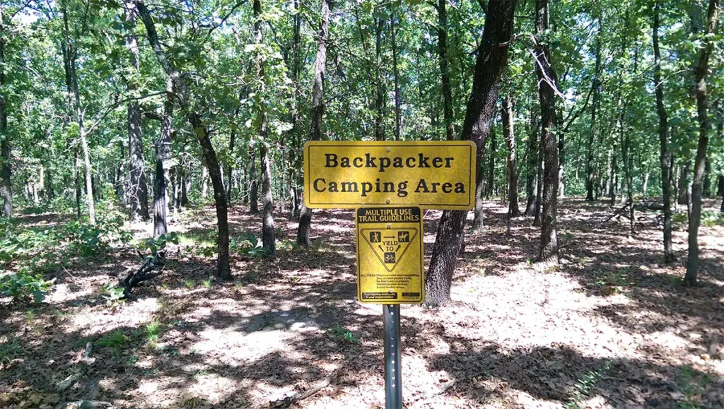 backpacking camping sign at mcgree creek state park in oklahoma