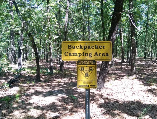 backpacking camping sign at mcgree creek state park in oklahoma